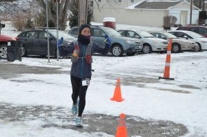 Still smiling. Approaching the halfway mark at the start line. 25 miles more to go!